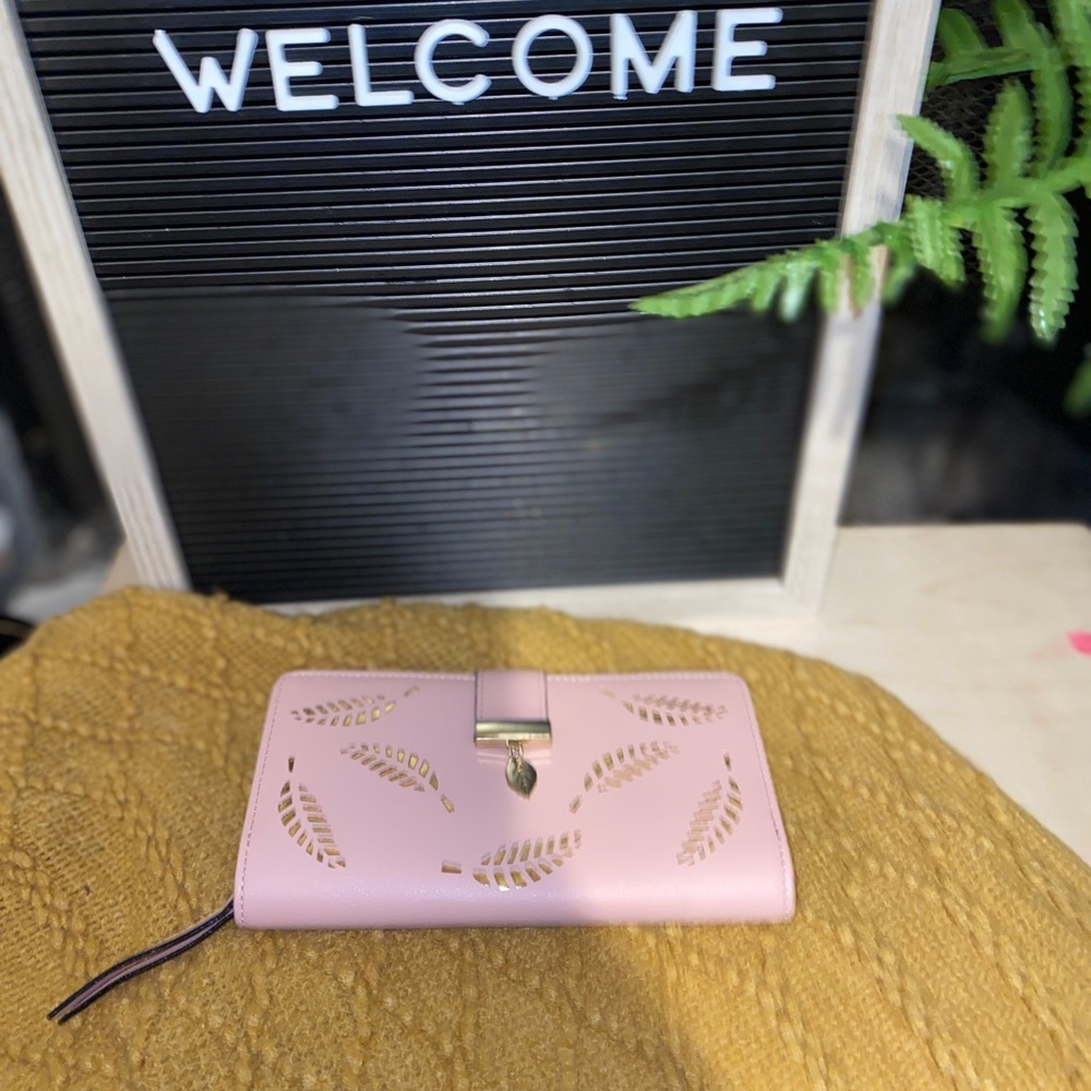 Pink leather wallet with gold leaf accents